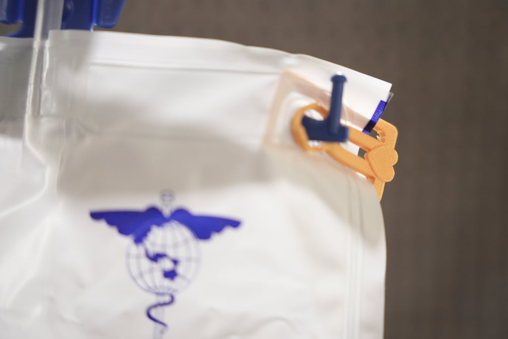 Urine bag hanger clips